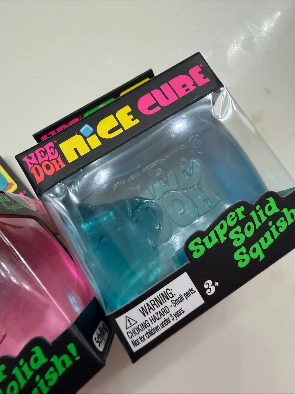 NeeDoh Nice Cube Super Solid Squish Toy - 2 Pack Bundle. Blue, Pink